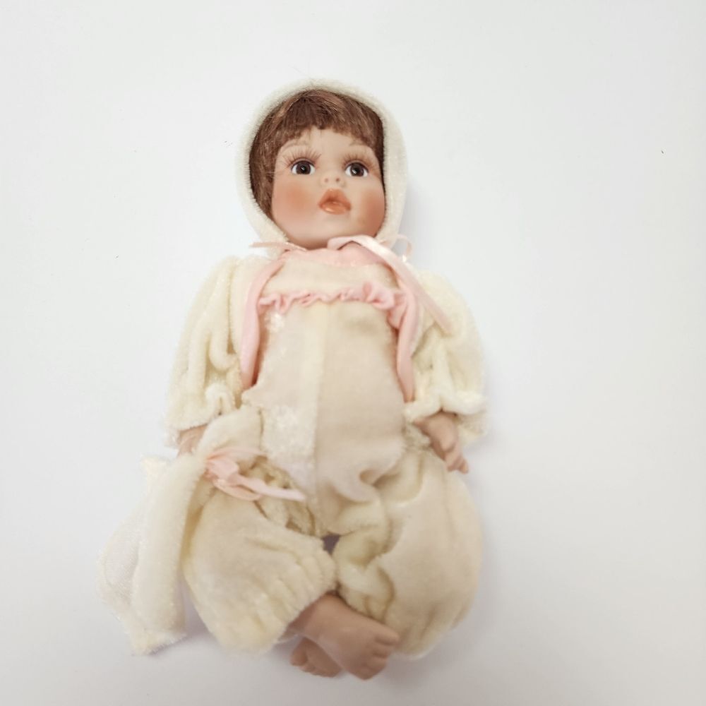 Vintage Geppeddo Porcelain Baby Doll with Bunny Ear Pajamas 8"
